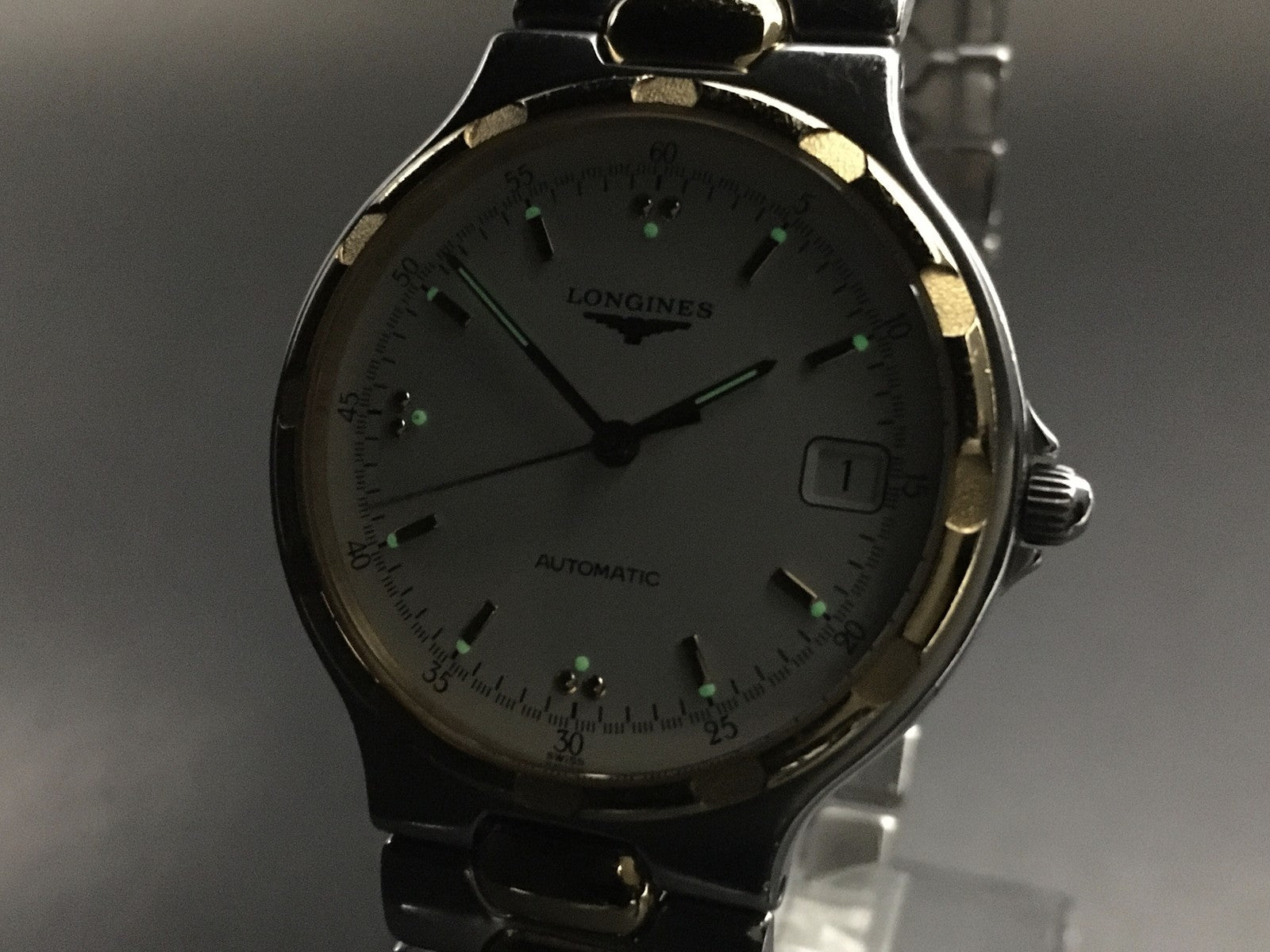 Longines Conquest L1.620.3 Date 35mm Automatic Gold Silver Men's Watch
