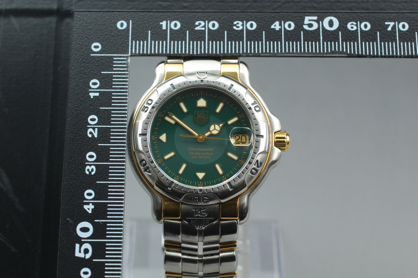 6980712