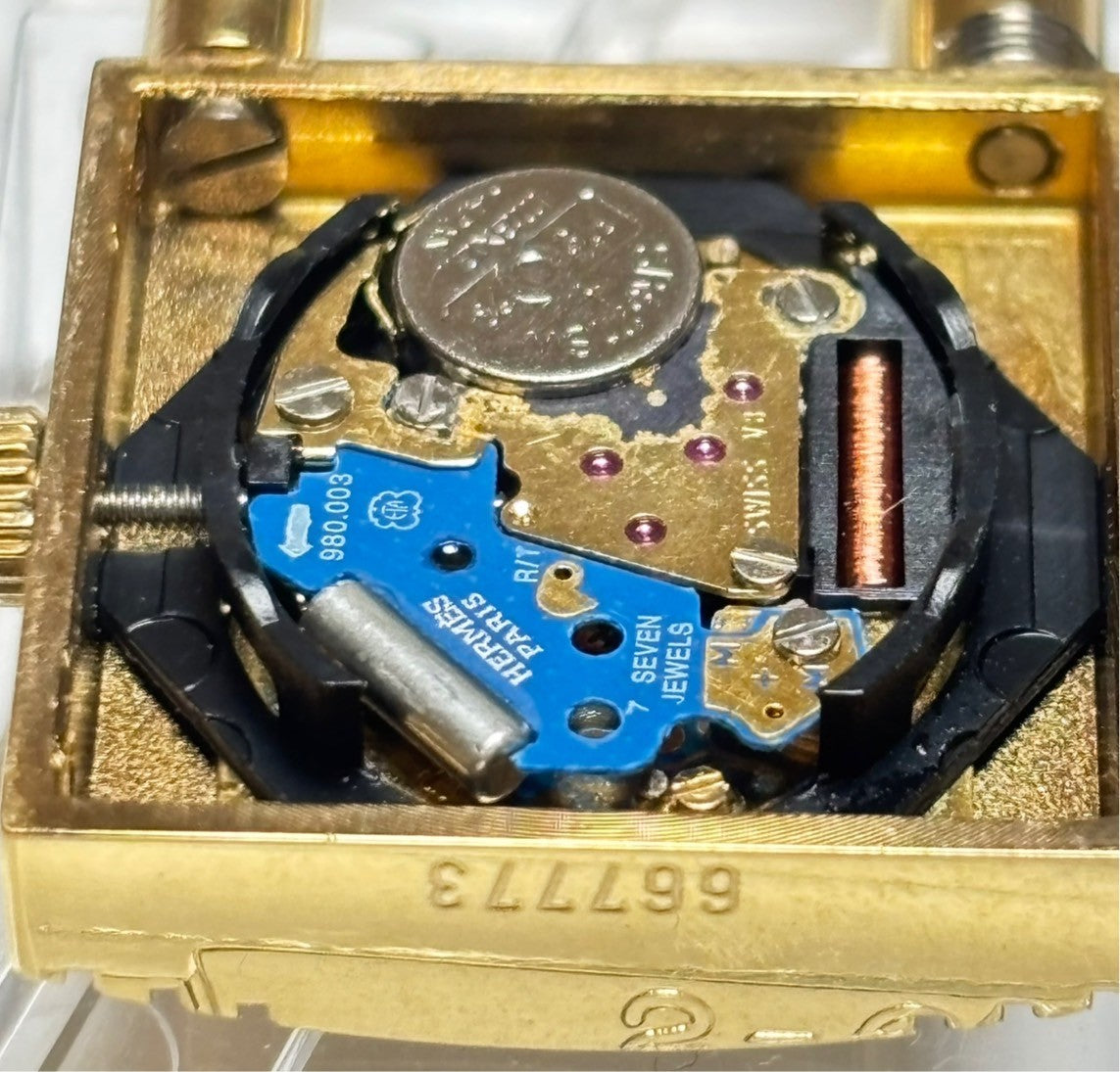 7751032