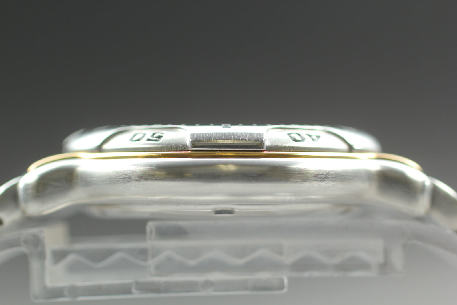 6980712
