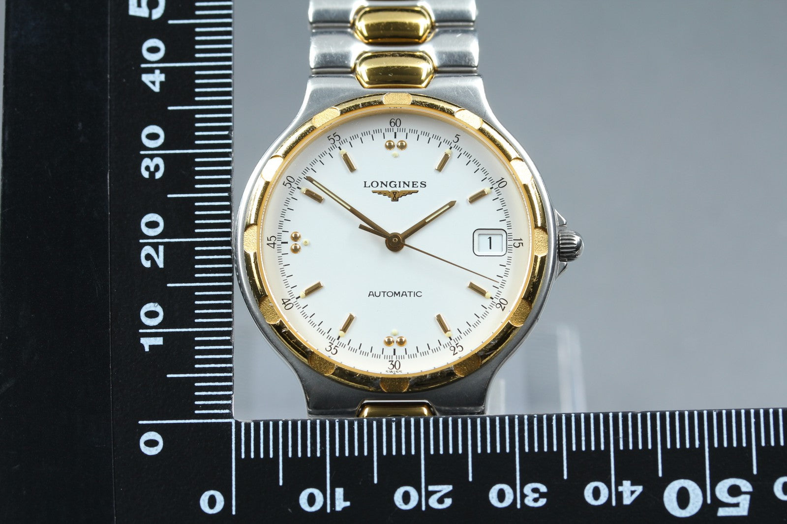 Longines Conquest L1.620.3 Date 35mm Automatic Gold Silver Men's Watch