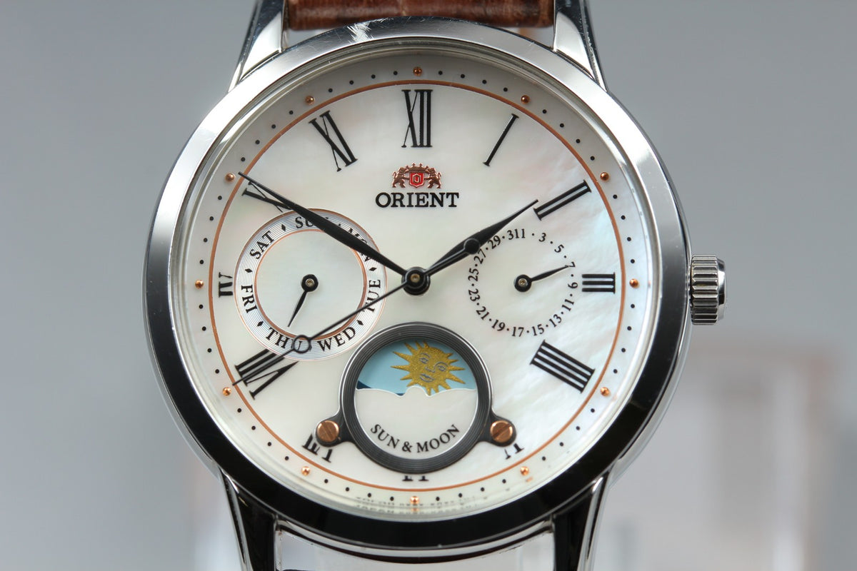 ORIENT Sun & Moon KUE0-UAA0 39mm Day/Date Silver Brown Unisex Watch