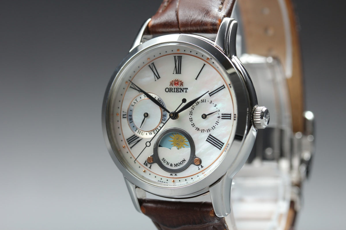 ORIENT Sun & Moon KUE0-UAA0 39mm Day/Date Silver Brown Unisex Watch