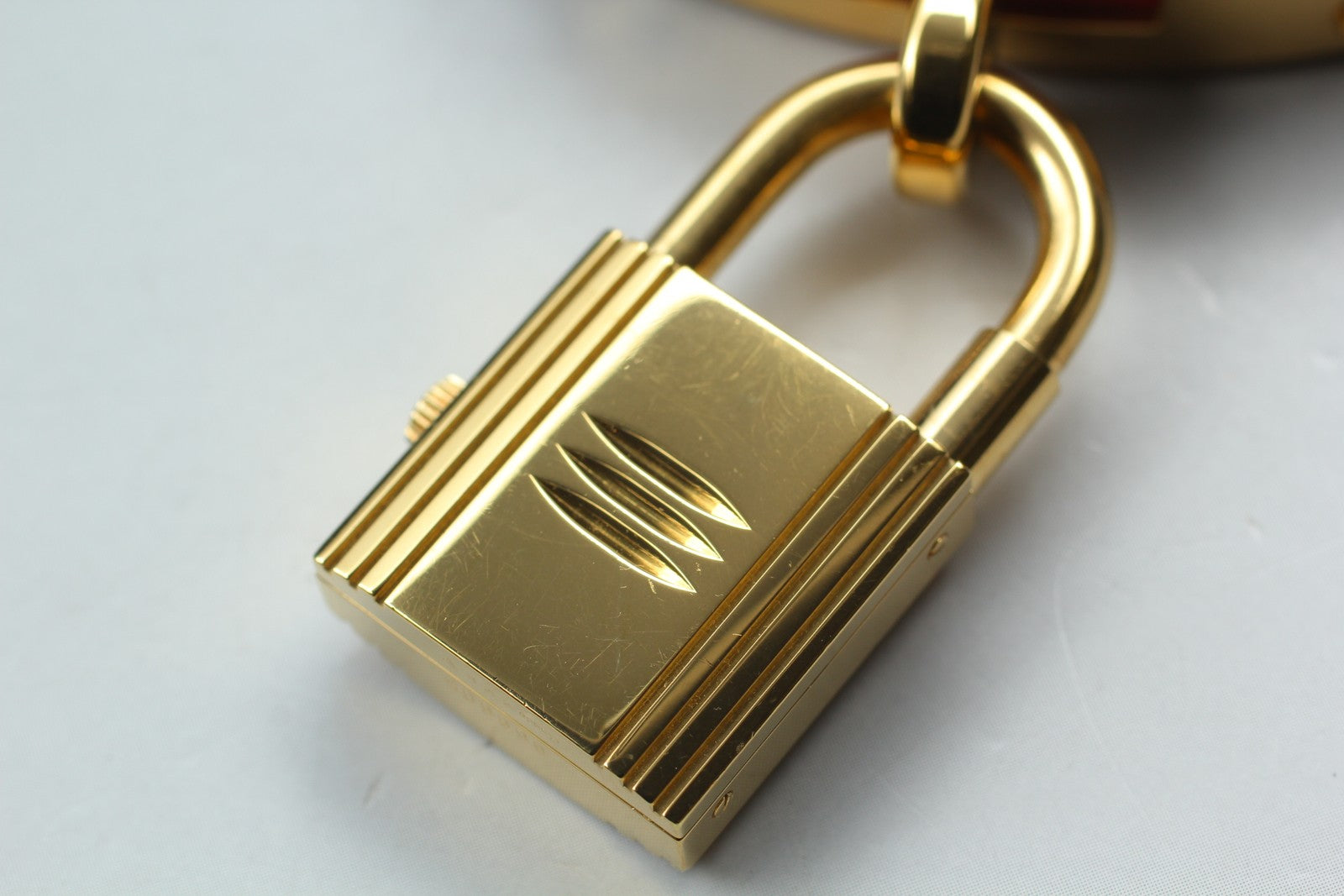 7696071