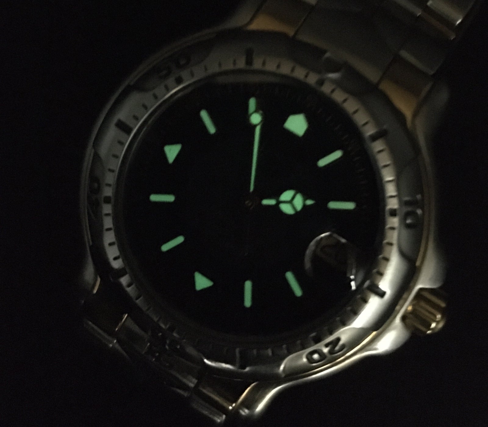 6980712