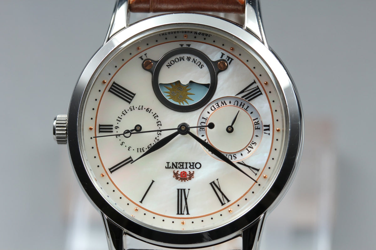 ORIENT Sun & Moon KUE0-UAA0 39mm Day/Date Silver Brown Unisex Watch
