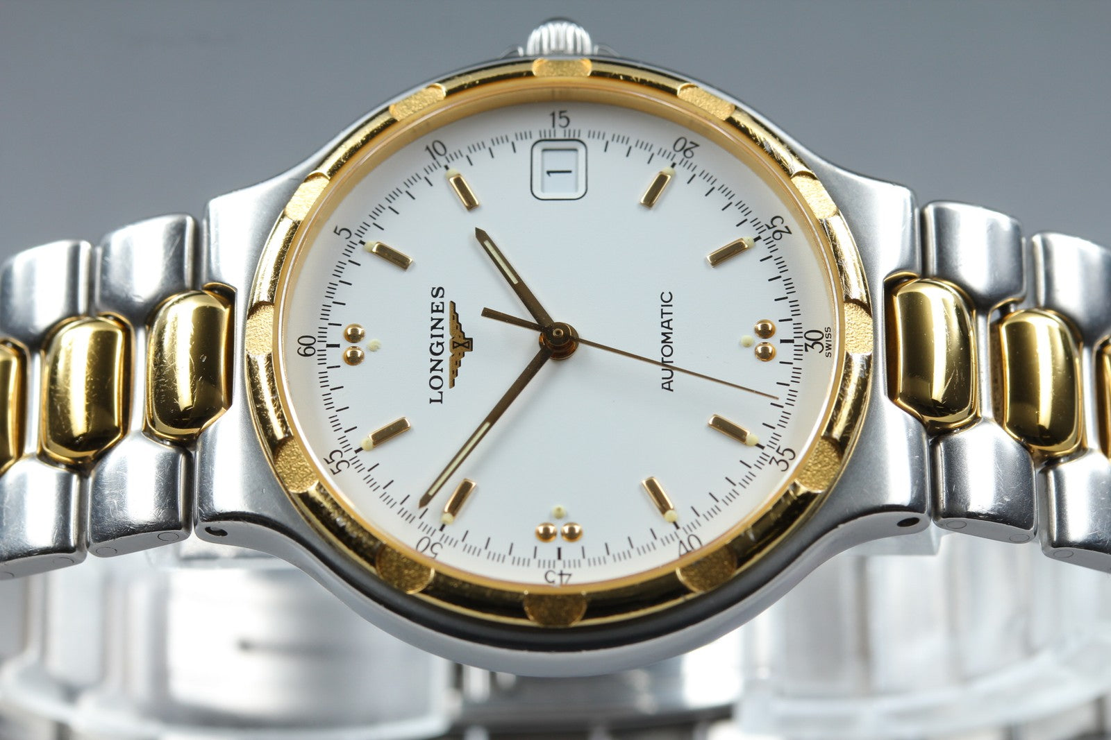 Longines Conquest L1.620.3 Date 35mm Automatic Gold Silver Men's Watch