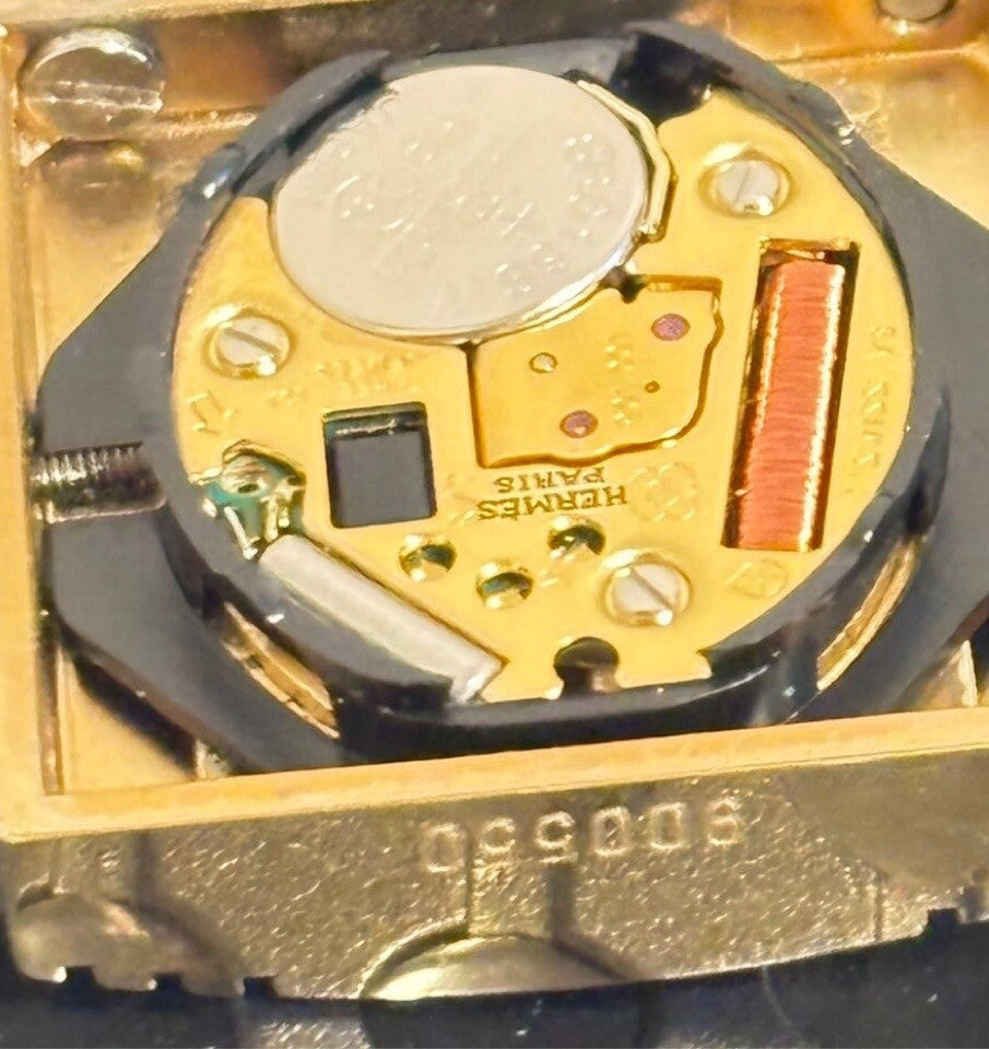 7573443