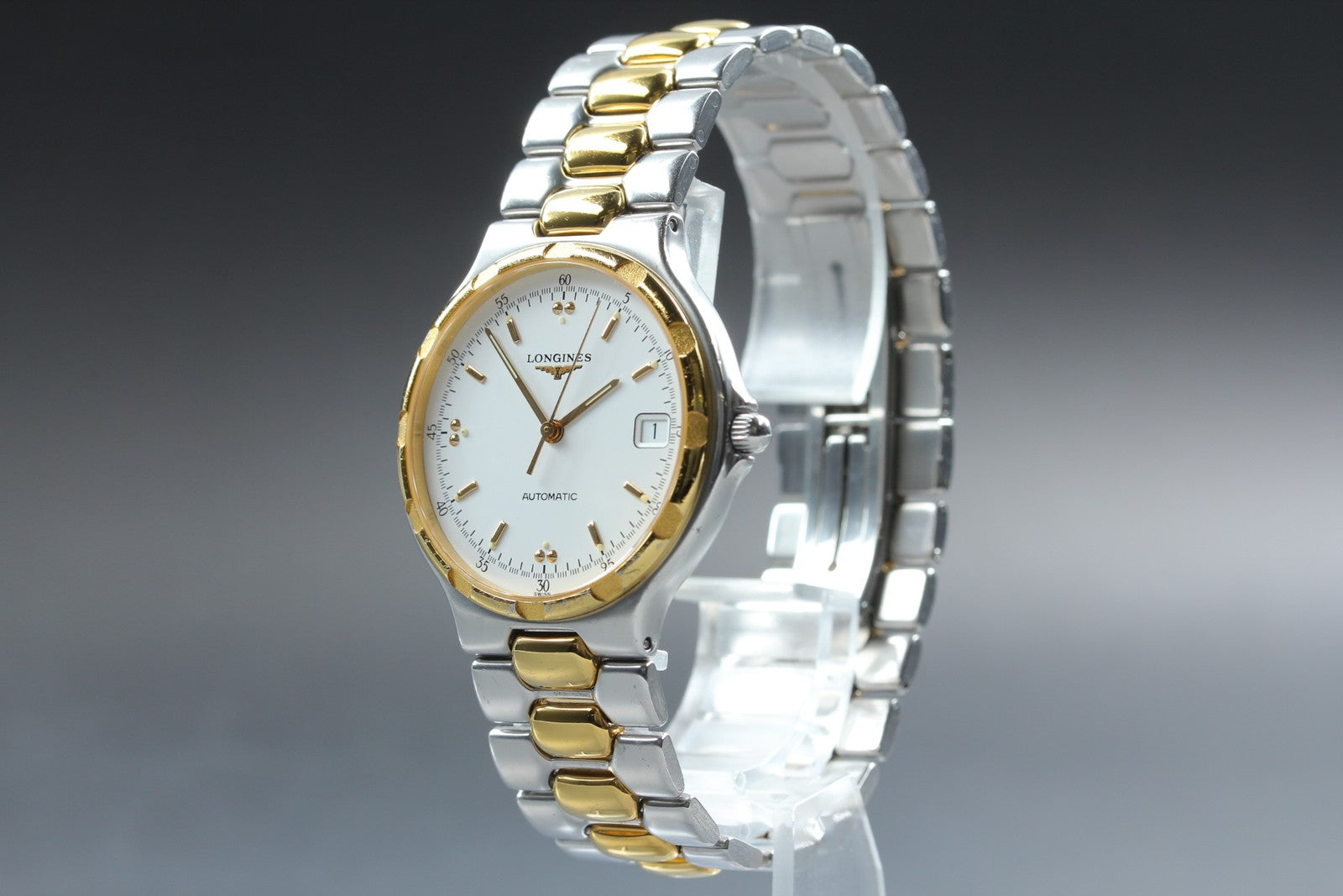 Longines Conquest L1.620.3 Date 35mm Automatic Gold Silver Men's Watch