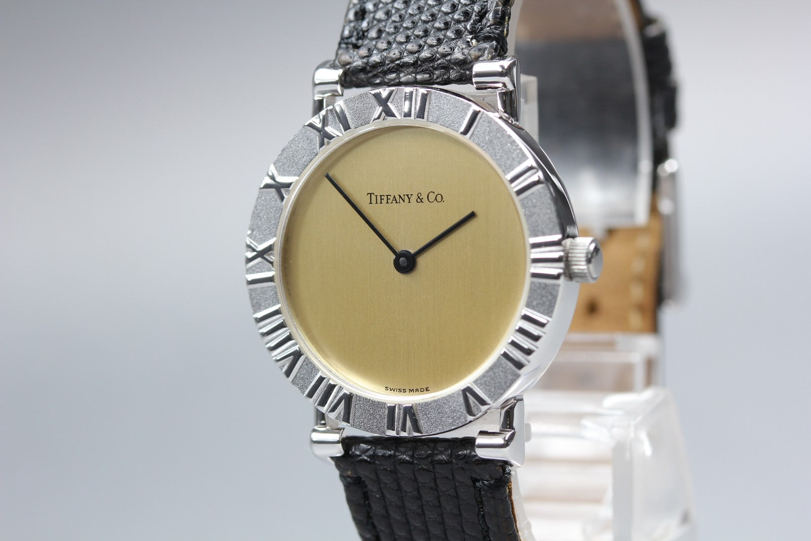 Tiffany & Co Atlas M0640 31mm Roman Silver Black Leather Unisex Quartz Watch
