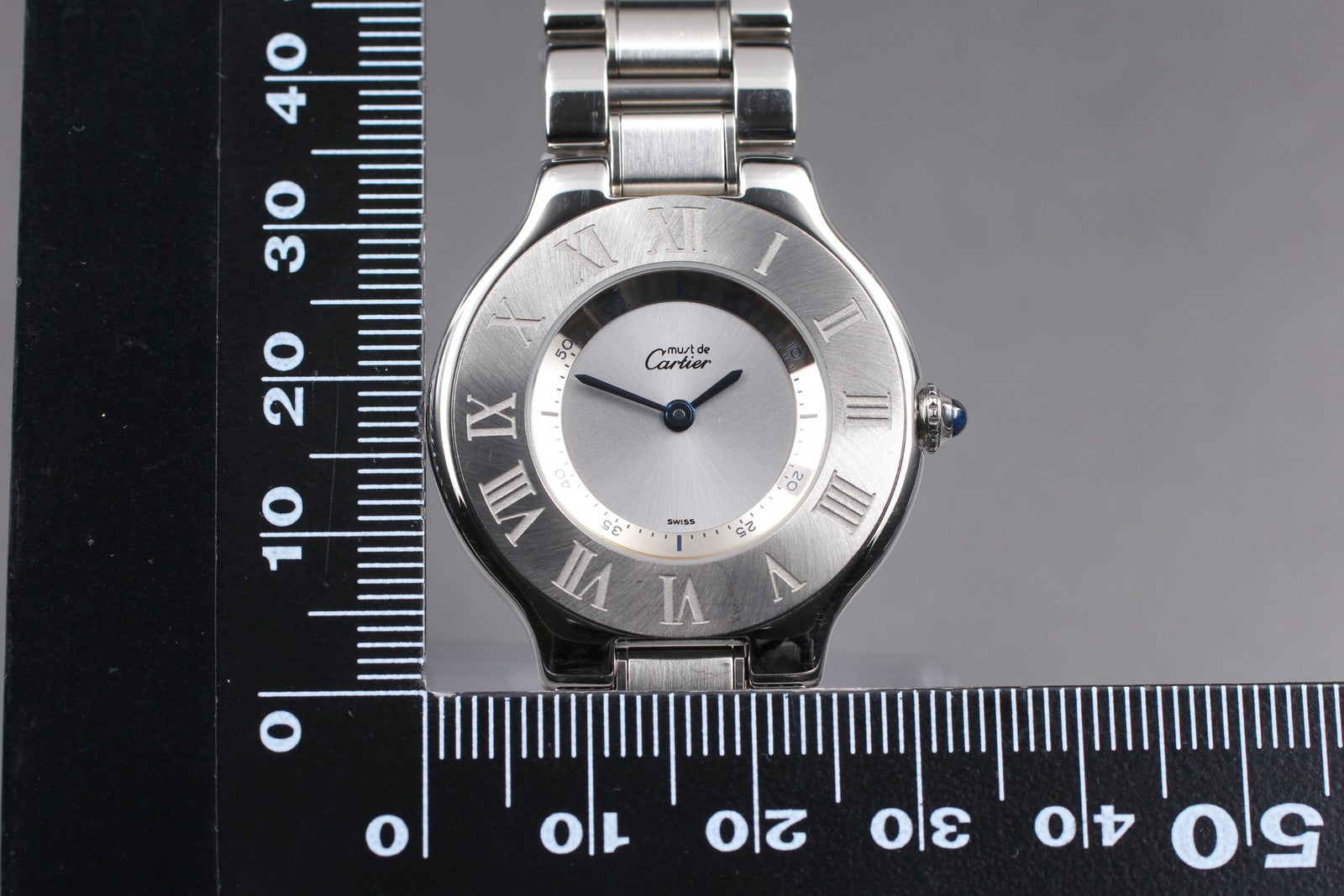 7696063
