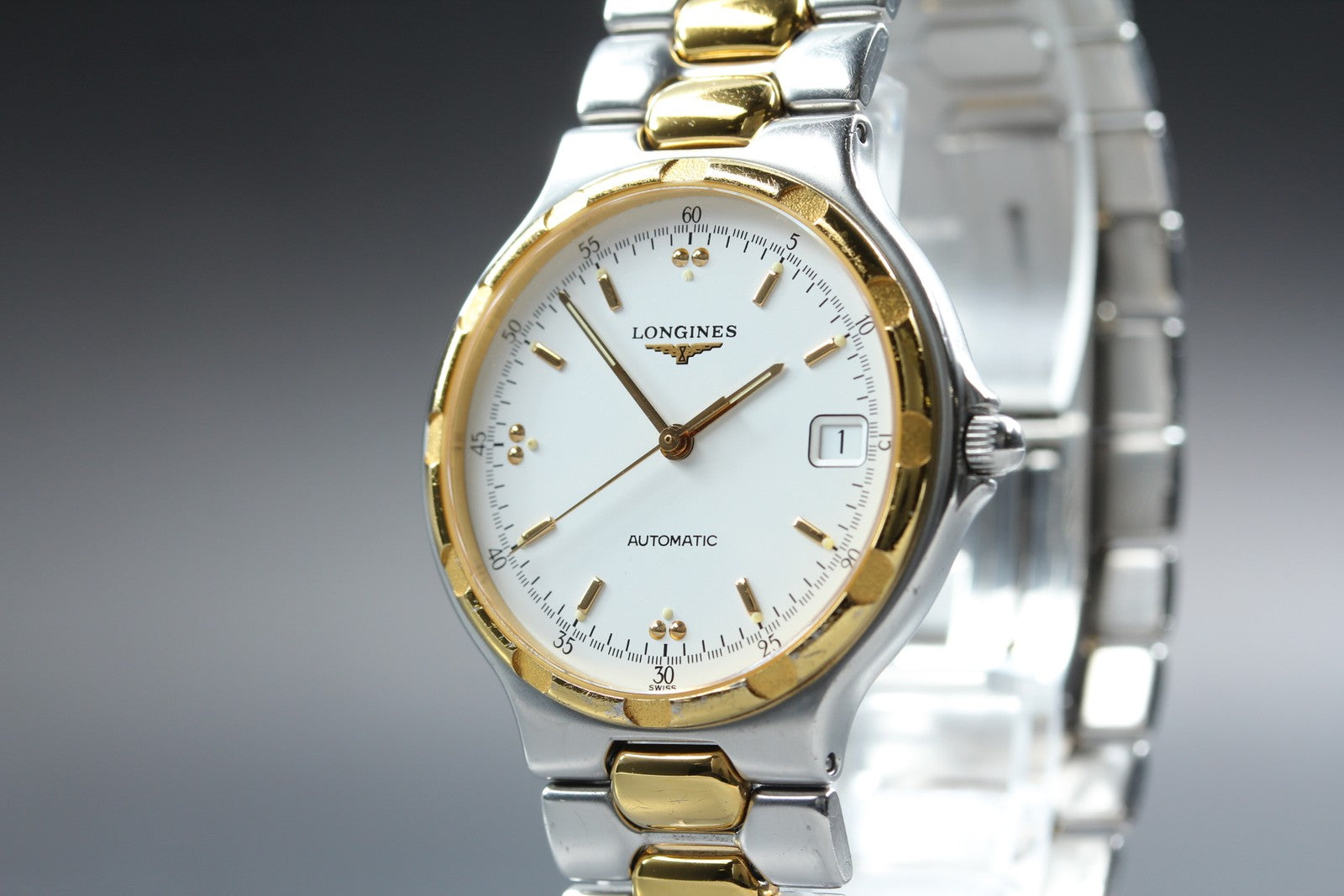 Longines Conquest L1.620.3 Date 35mm Automatic Gold Silver Men's Watch