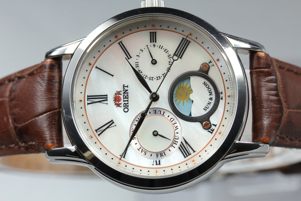 ORIENT Sun & Moon KUE0-UAA0 39mm Day/Date Silver Brown Unisex Watch