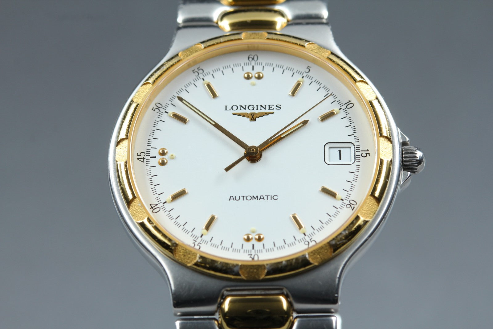 Longines Conquest L1.620.3 Date 35mm Automatic Gold Silver Men's Watch