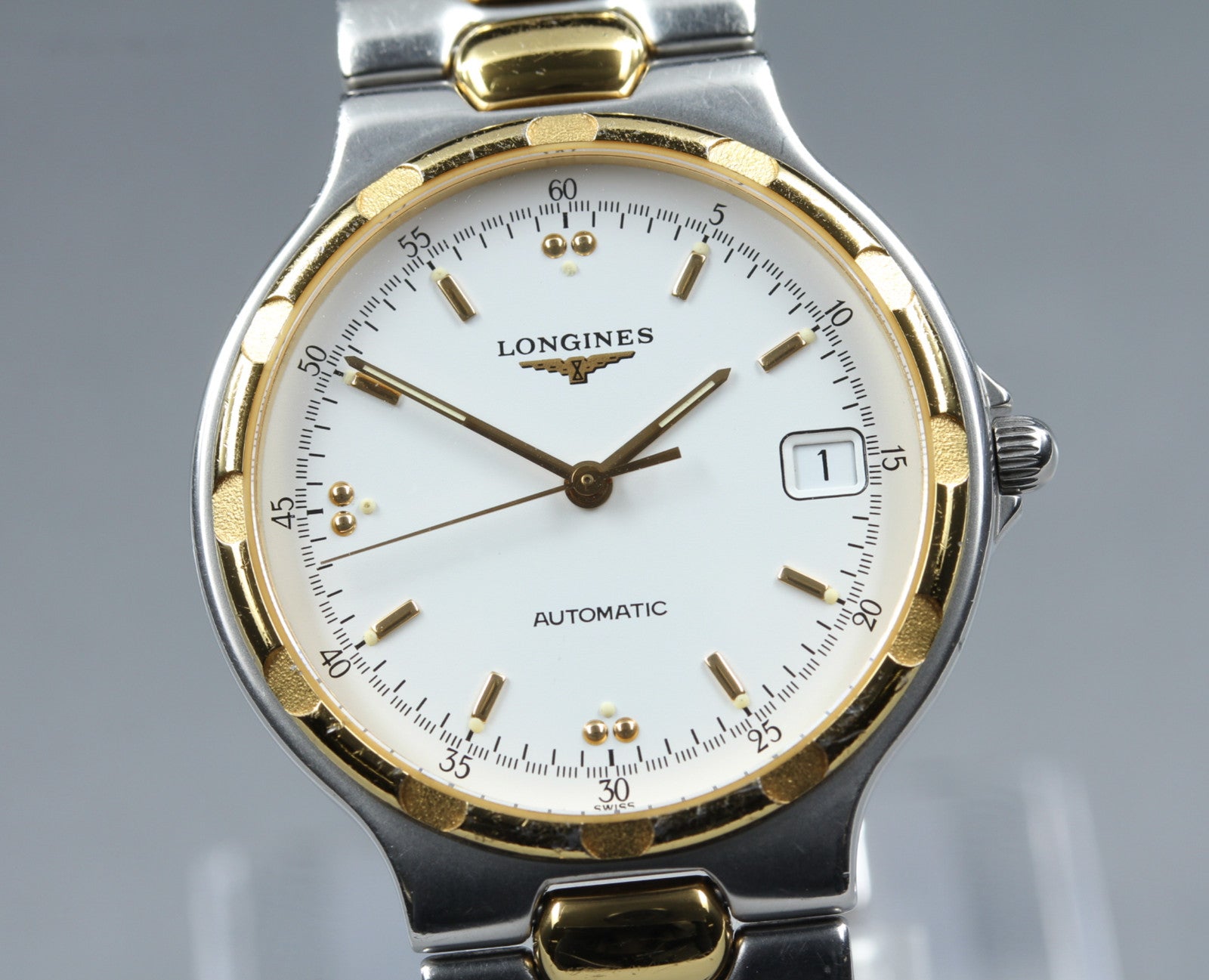 Longines Conquest L1.620.3 Date 35mm Automatic Gold Silver Men's Watch
