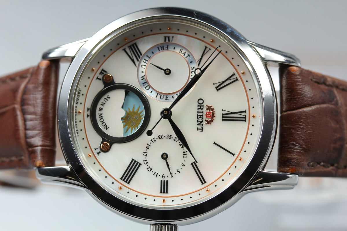 ORIENT Sun & Moon KUE0-UAA0 39mm Day/Date Silver Brown Unisex Watch