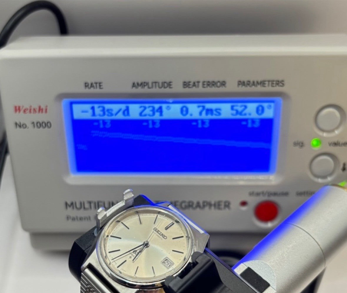 7710400