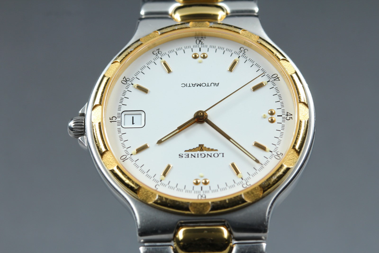 Longines Conquest L1.620.3 Date 35mm Automatic Gold Silver Men's Watch